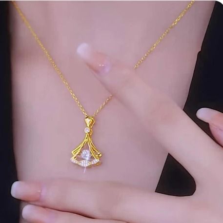 Gold plated fan necklace.